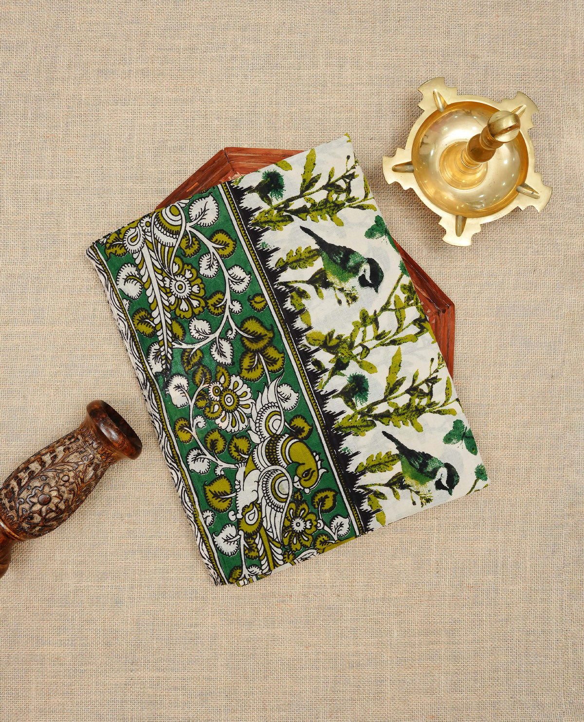 Green,olive green ,black & cream colour kalamkari cotton saree featuring kalamkari printed body & pallu, paired with a matching contrast blouse piece.