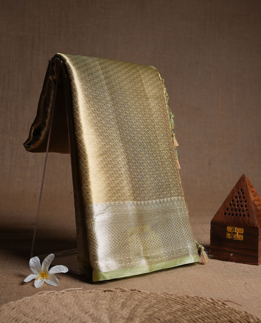 Gold colour Pure banaras tissue silk saree featuring gold zari brocade design across body, with contrast pink colour with silver zari brocade border, finished with a matching blouse. (Copy)