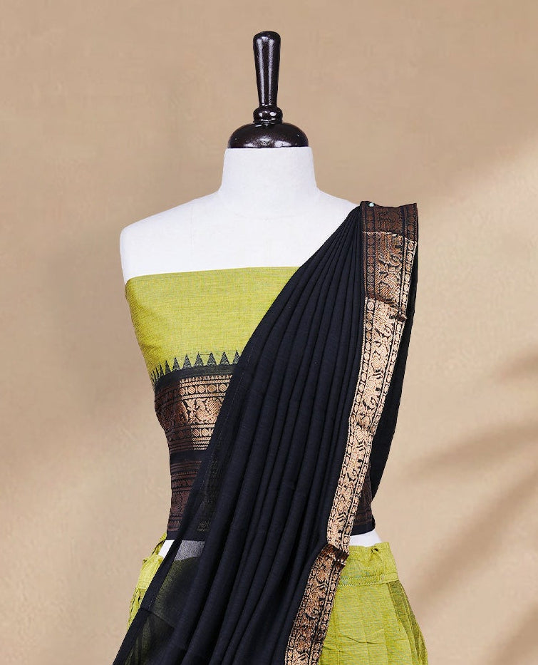 Olive green colour Half saree featuring Plain skirt with Zari border on contrast black colour border, Unstitched Blouse and matching dupatta.
