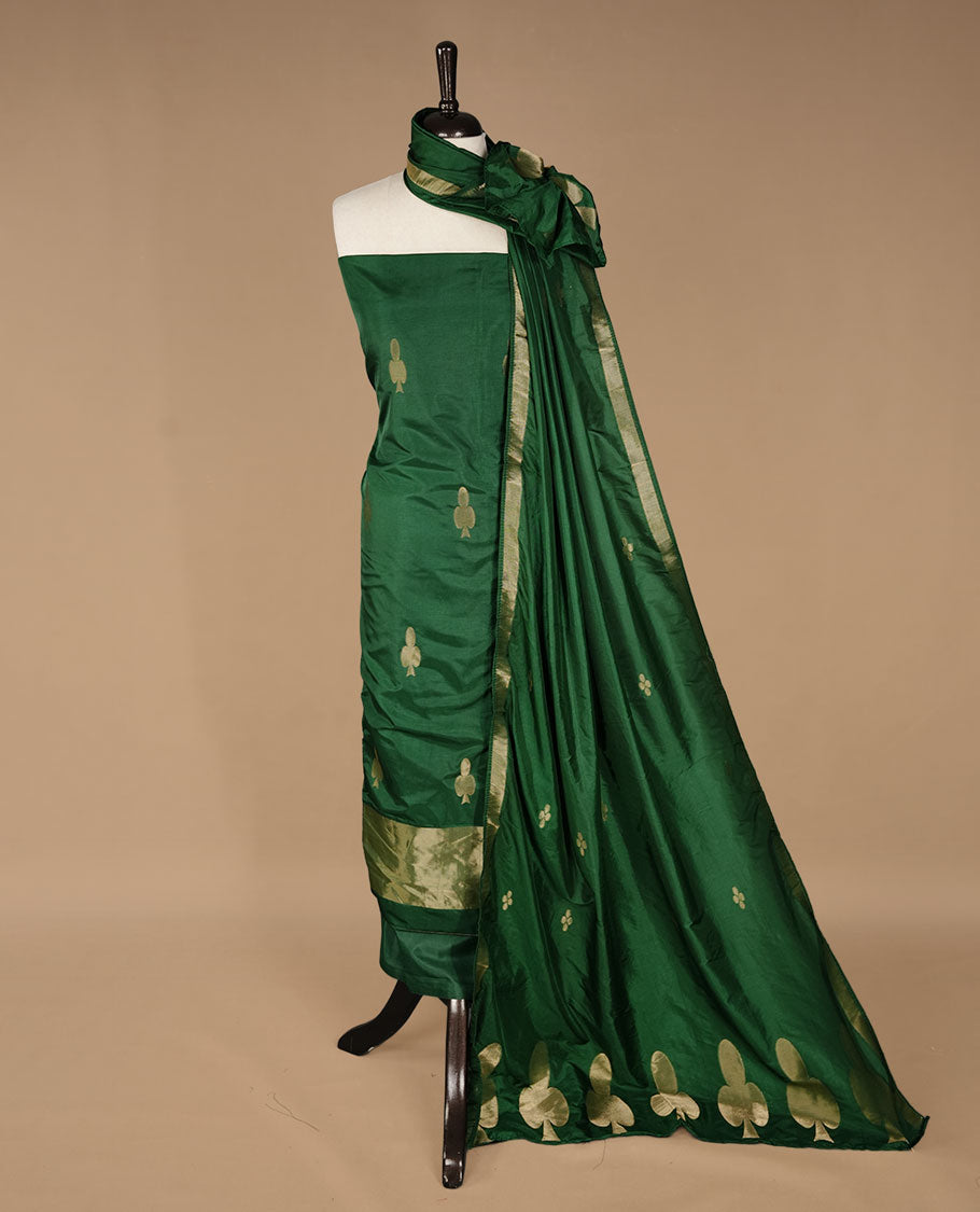 Green colour churidar materal featuring gold zari card pattern on body, border, paired with matching bottom and dupatta.