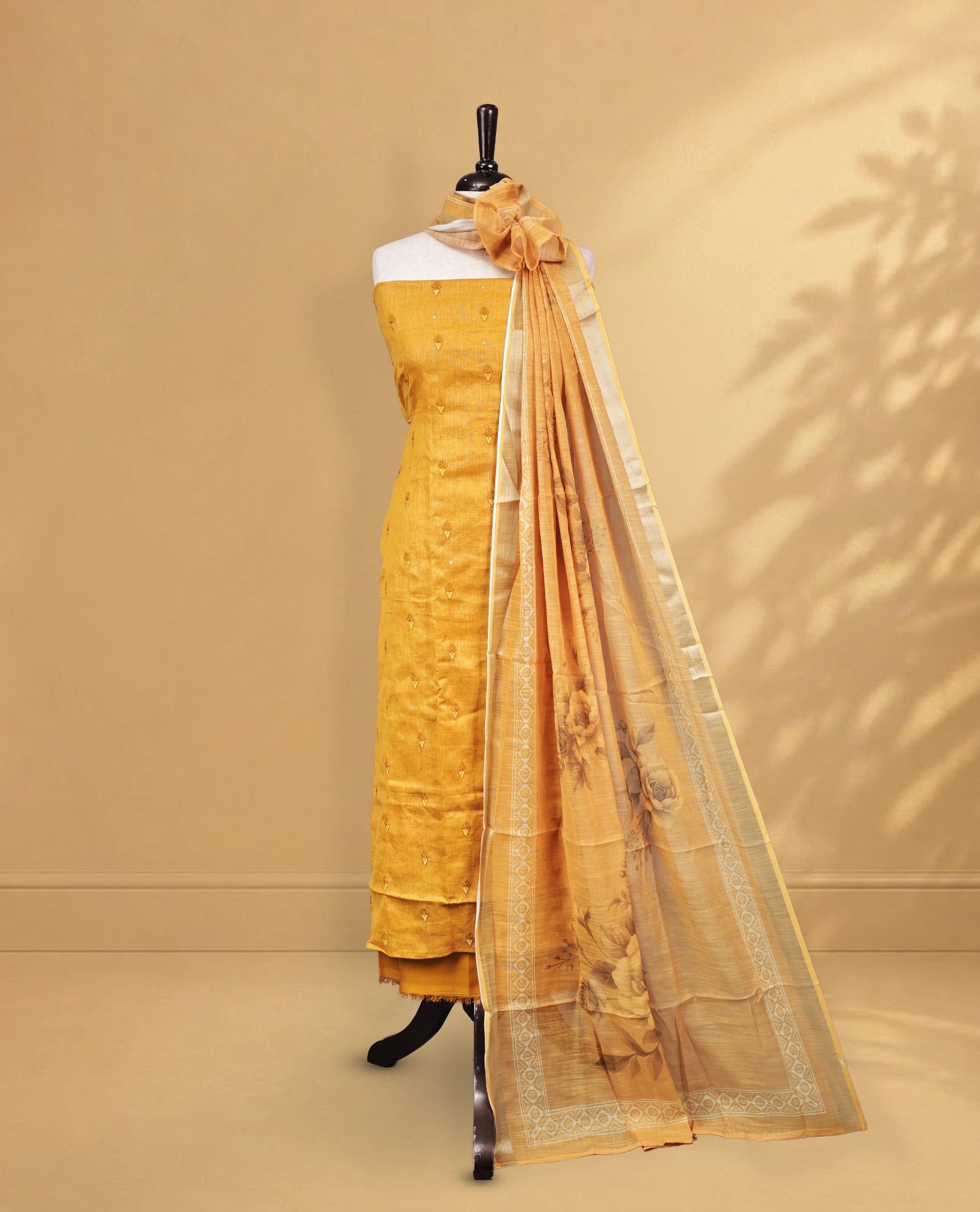 Mastard Colour Salwar material Featuring Embroidery work on body, paired with Matching Bottom and same Patterned Dupatta.