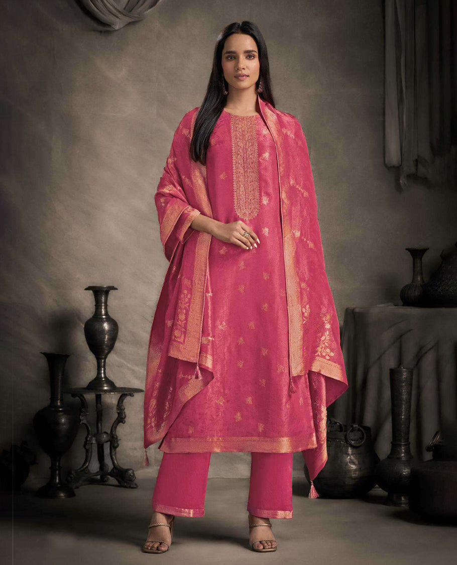 Pink colour suit material featuring an Akina silk jacquard top with delicate embroidery, paired with satin bottoms and completed with a matching Akina silk jacquard dupatta