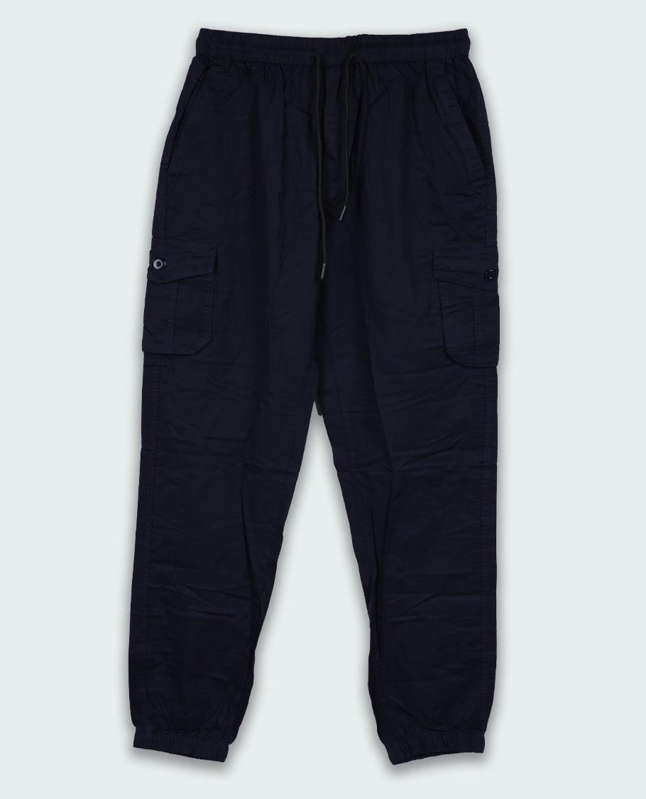 Dark navy blue colour Cargo Jogger Pants, Designed in a regular fit, they feature flap pockets, a drawstring waist, and cuffed hems.