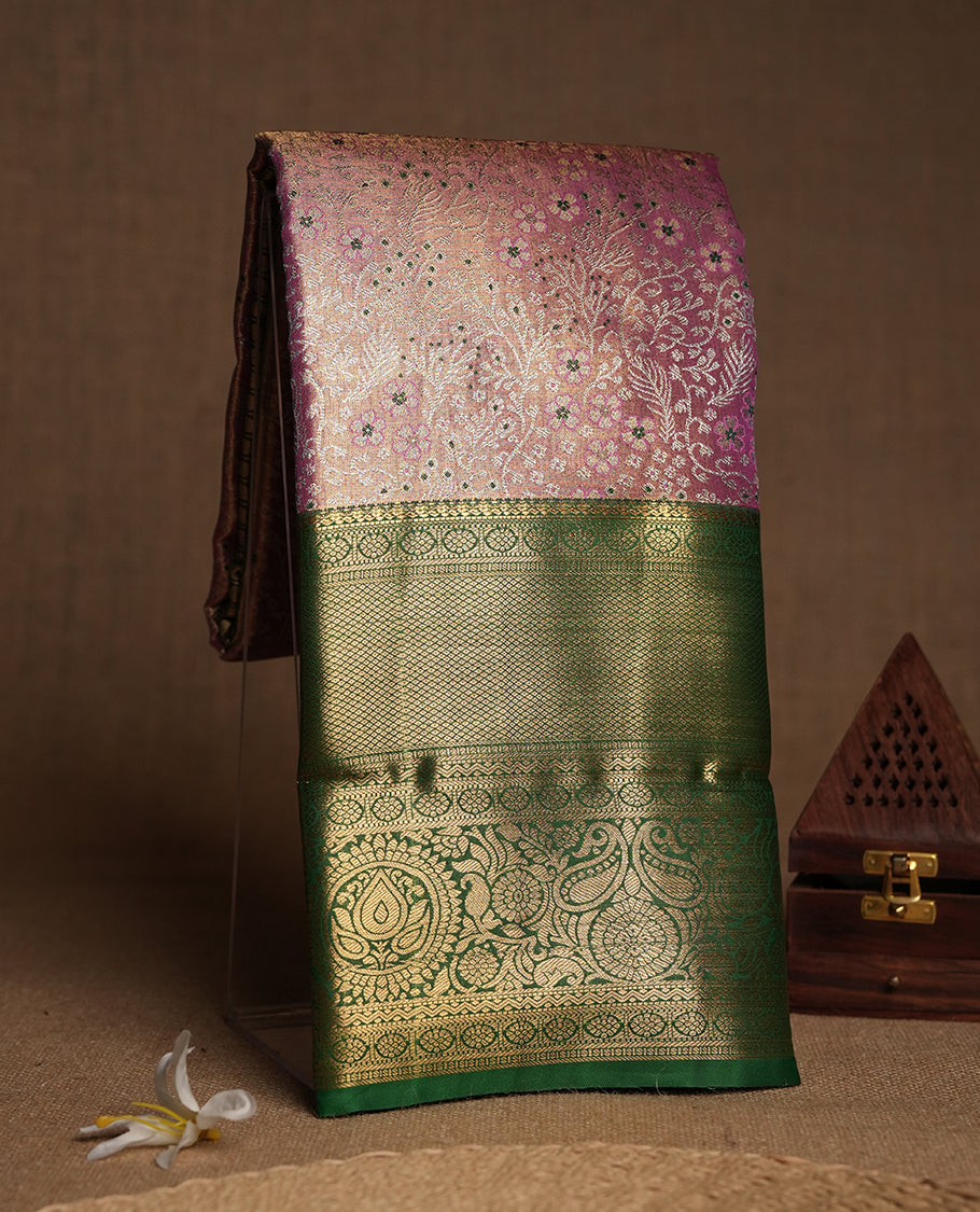 Flamingo Pink colour and Antique silver Zari Tissue Brocade Saree features intricate coloured floral Motifs on body and a green colour with traditional border & pallu, paired with matching blouse