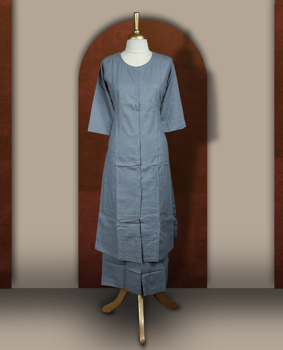 Grey colour cotton coord set featuring a button down kurta with 3/4 sleeves and matching straight pants.