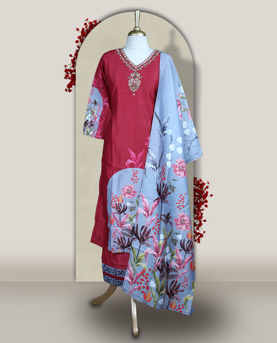 Light maroon colour churidhar set with sequin and bead embroidered neckline, paired with a light grey floral printed dupatta and matching bottom & A graceful choice for festive gatherings and casual outings.