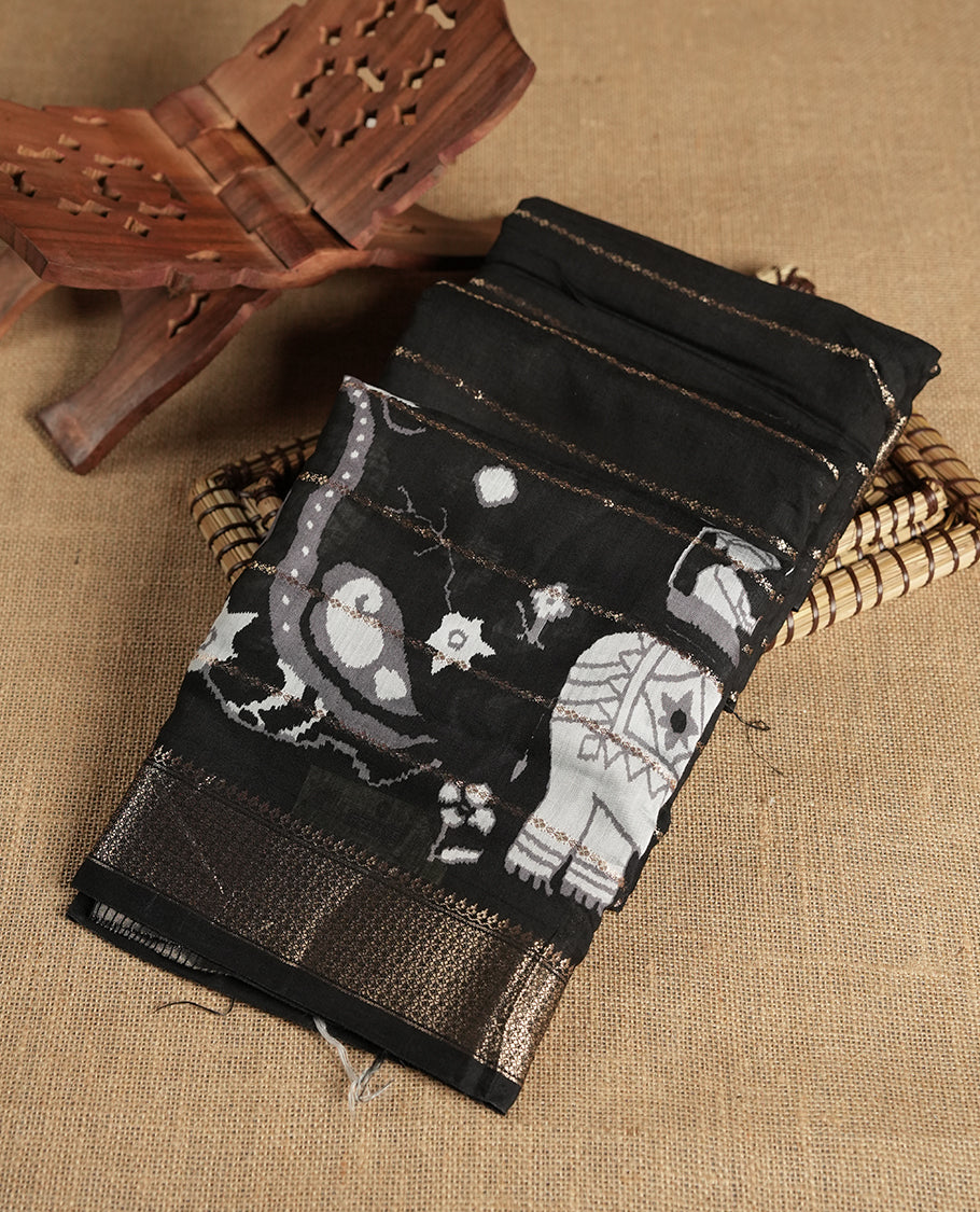 Black colour chanderi silk saree with gold zari strip pattern On body, compilmented by self colour border with antique zari pattern & white animal print pattern and a matching blouse.
