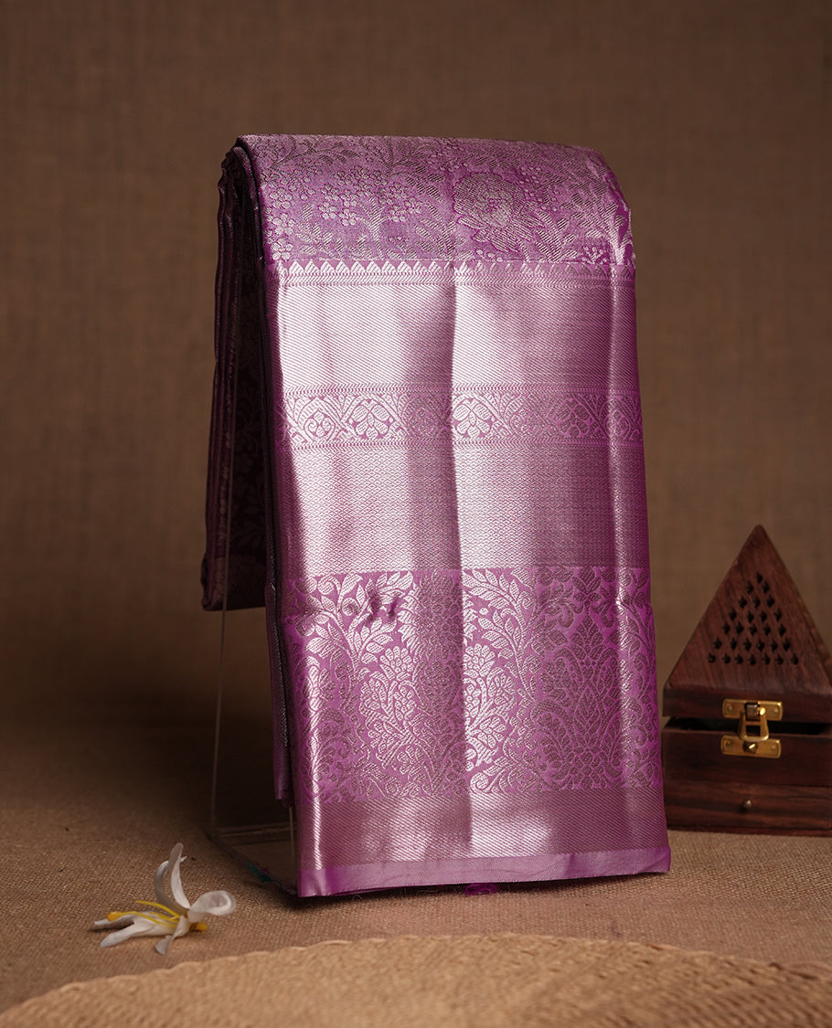 Lavender magenta and Antique silver Zari Tissue Brocade Saree features intricate floral Motifs on body and rose gold colour traditional border & pallu with floral patterns, paired with matching blouse