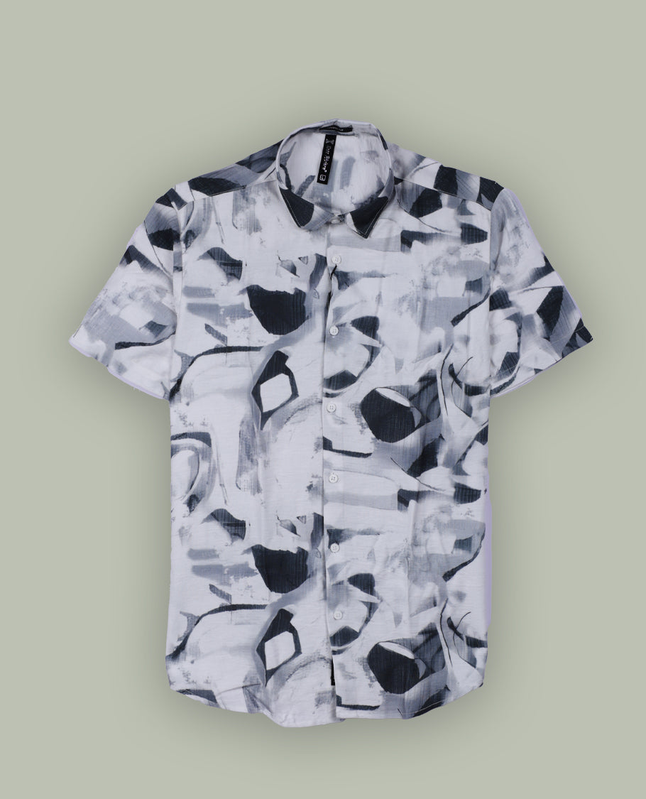 White colour shirt featuring bold green abstract brushstroke patterns, Styled with a classic collar and short sleeves, it brings a modern, artistic edge to your casual wardrobe.