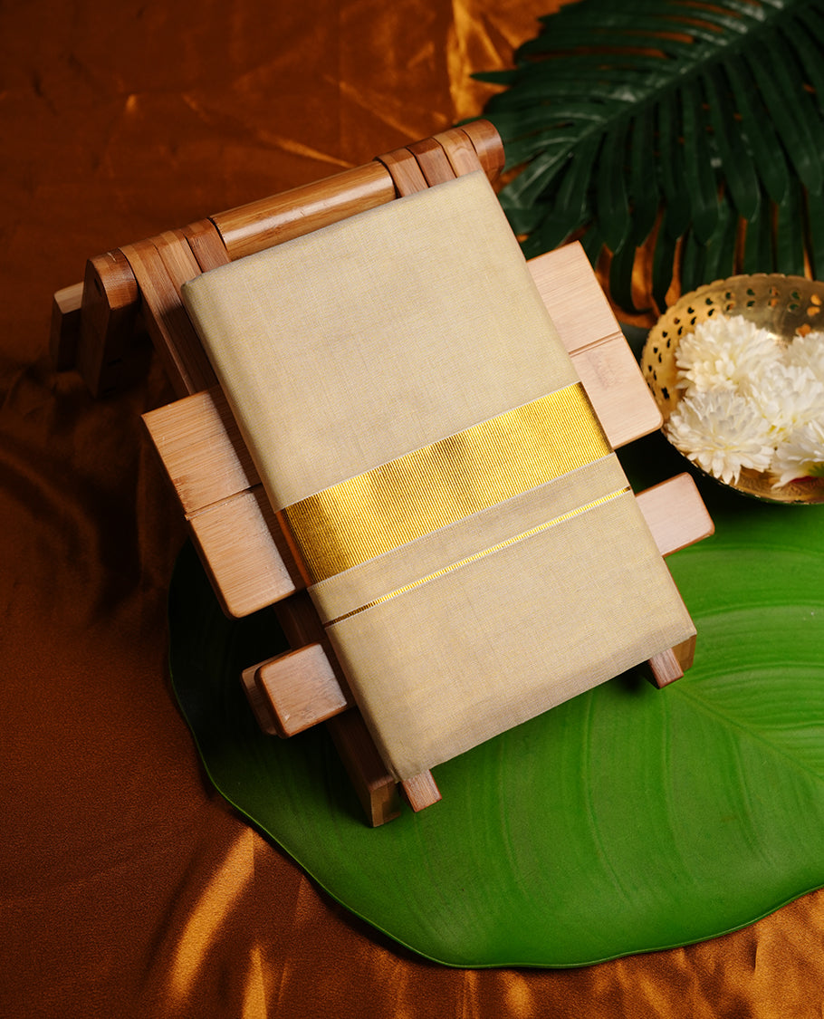 Cream colour MCR cotton double dhoti featuring 3 inch gold kasavu zari border