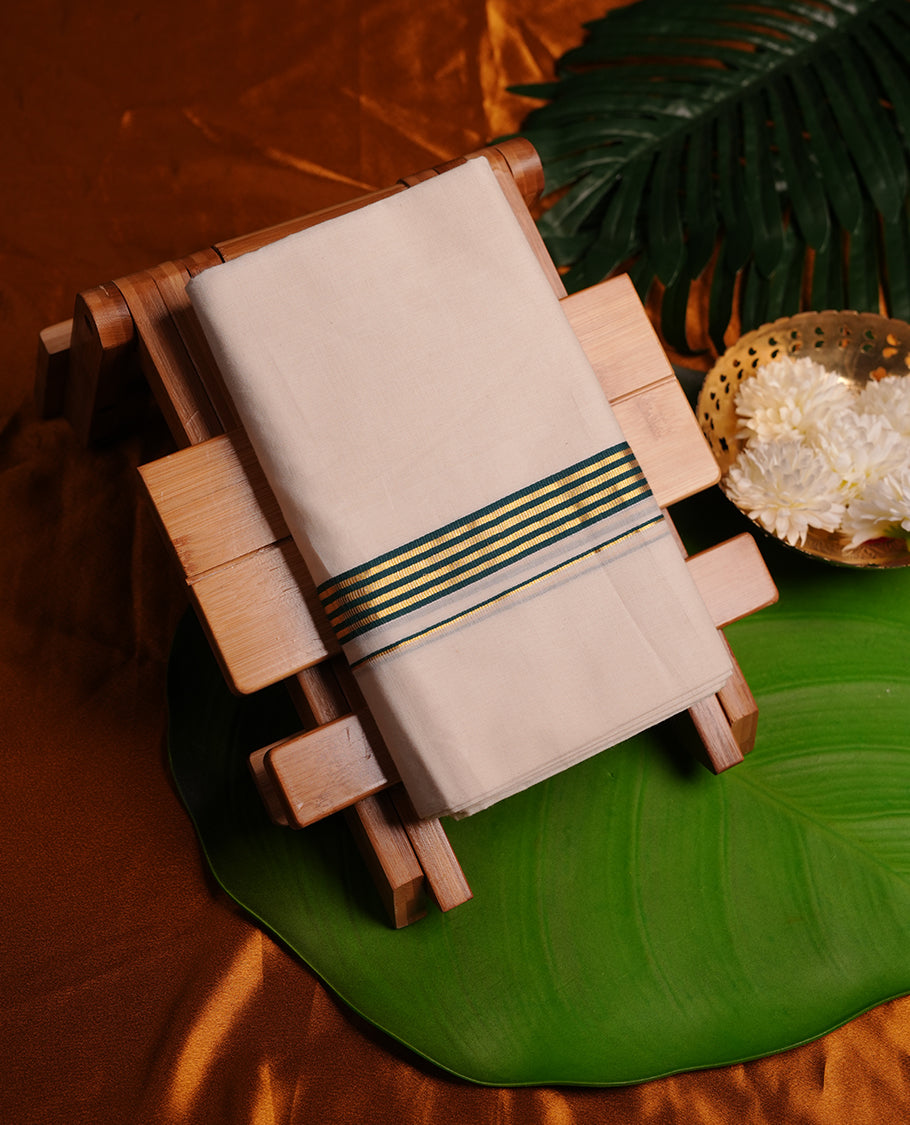 Cream colour cotton double dhoti featuring dark green and gold colour border