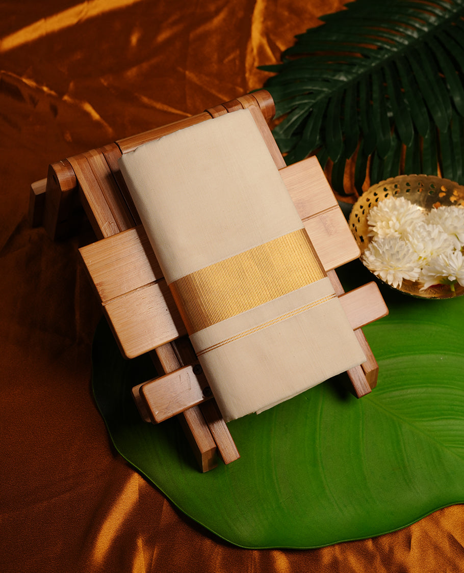 Cream colour cotton double dhoti featuring 2 inch gold kasavu zari border