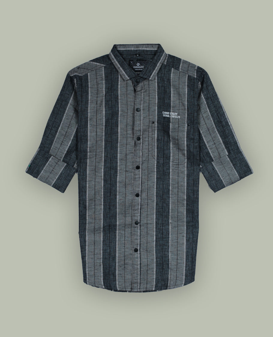 Grey colour striped shirt featuring a smart classic collar and comfortable full sleeves, Crafted in a soft fabric with a front button placket and minimal chest text print, giving a casual yet stylish appeal.