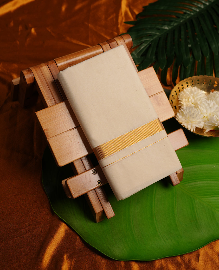 Cream colour cotton double dhoti featuring 2 inch gold kasavu zari border