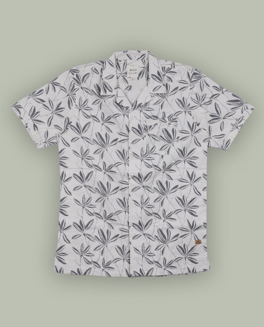 Off white colour short sleeve shirt features a rounded spread collar and a grey colour jacquard print all over & its ideal for both casual days and laid back evenings.