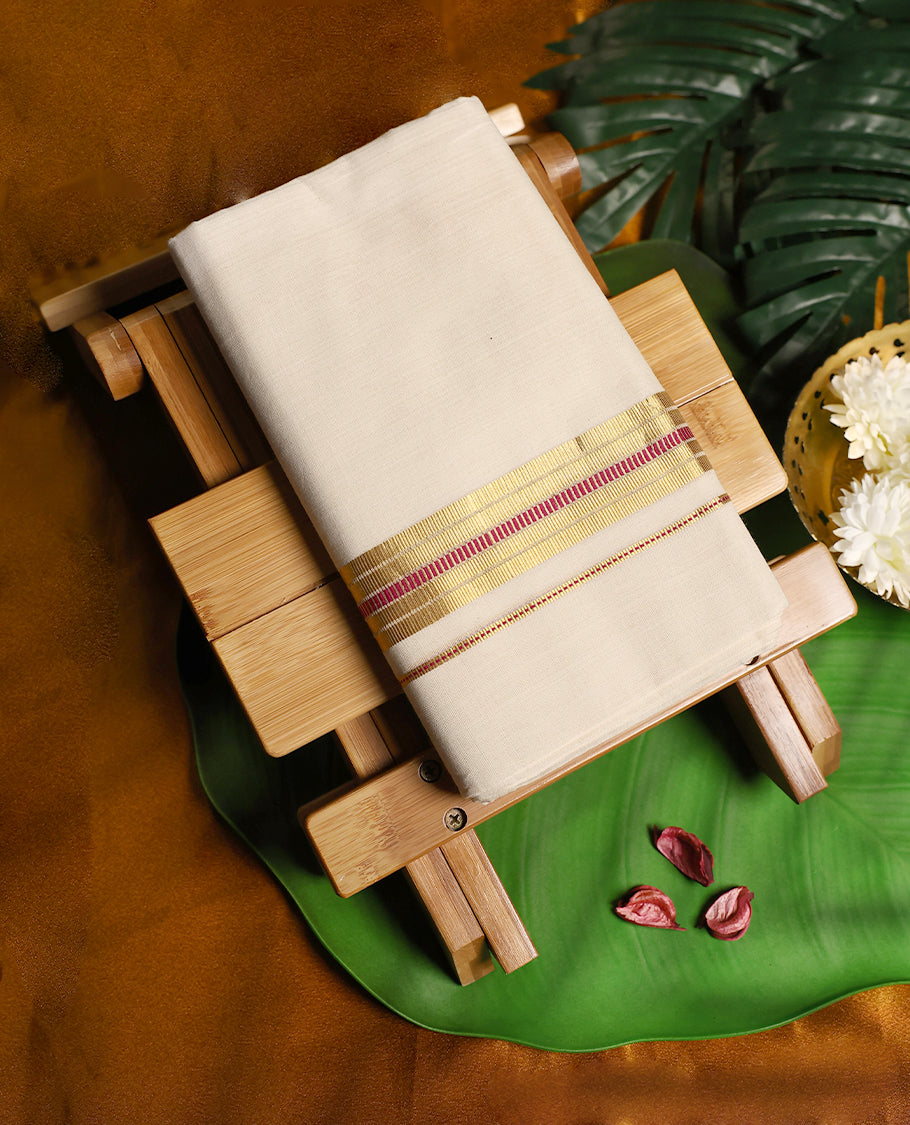 Traditional off white pure handloom cotton double dhoti highlighted with a golden zari border and dark magenta accents, creating a rich and graceful look ideal for weddings, festive occasions, and cultural ceremonies.