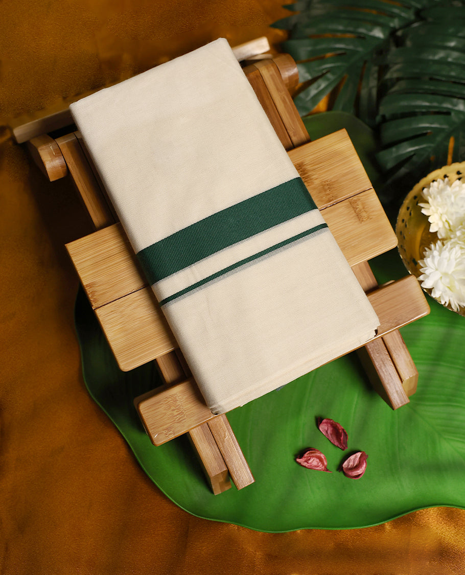 Simple off white cotton double dhoti featuring a bold dark green border with minimal stripe accents, offering a subtle and elegant traditional look perfect for daily wear, rituals, and festive occasions.