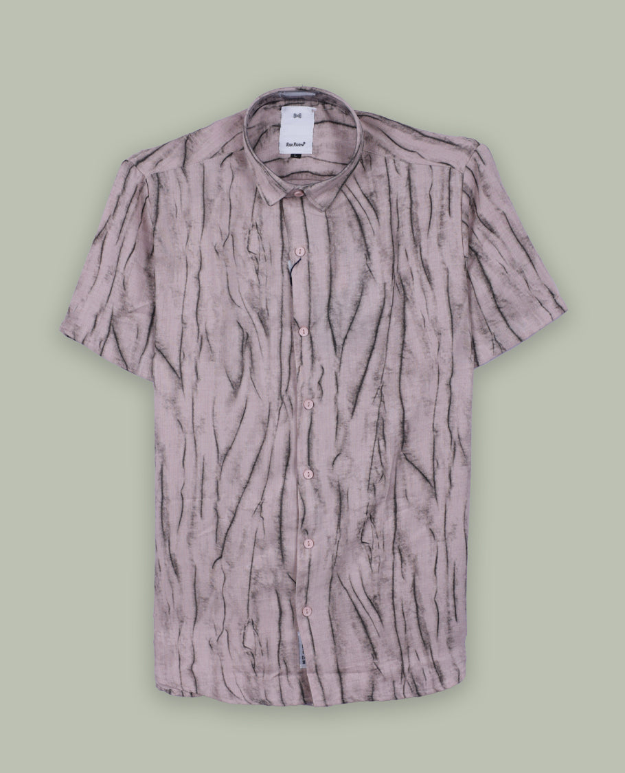 Light mauve short sleeve shirt featuring a unique crinkled black linear pattern, button down front, and classic collar & Crafted from breathable fabric, perfect for a casual yet stylish everyday look.