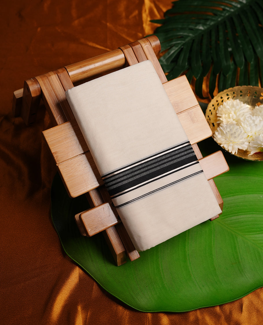 Cream colour cotton double dhoti featuring black colour border with silver zari border