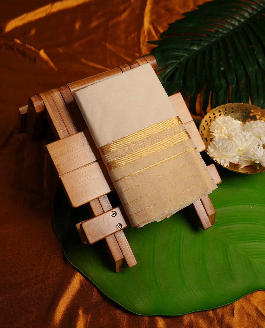 Cream colour cotton double dhoti featuring gold kasavu zari border