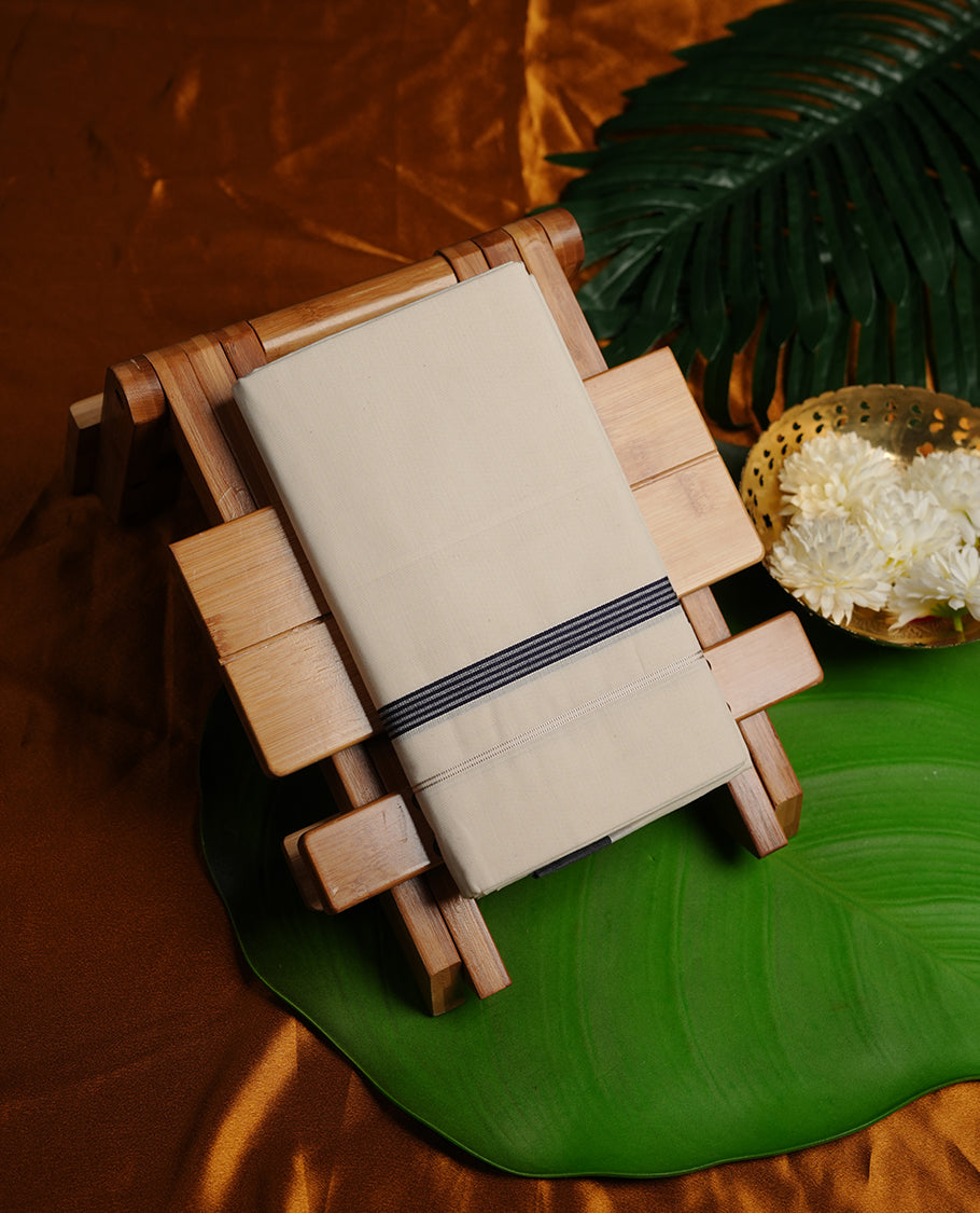 Cream colour cotton single dhoti fearturing navy blue colour simple border