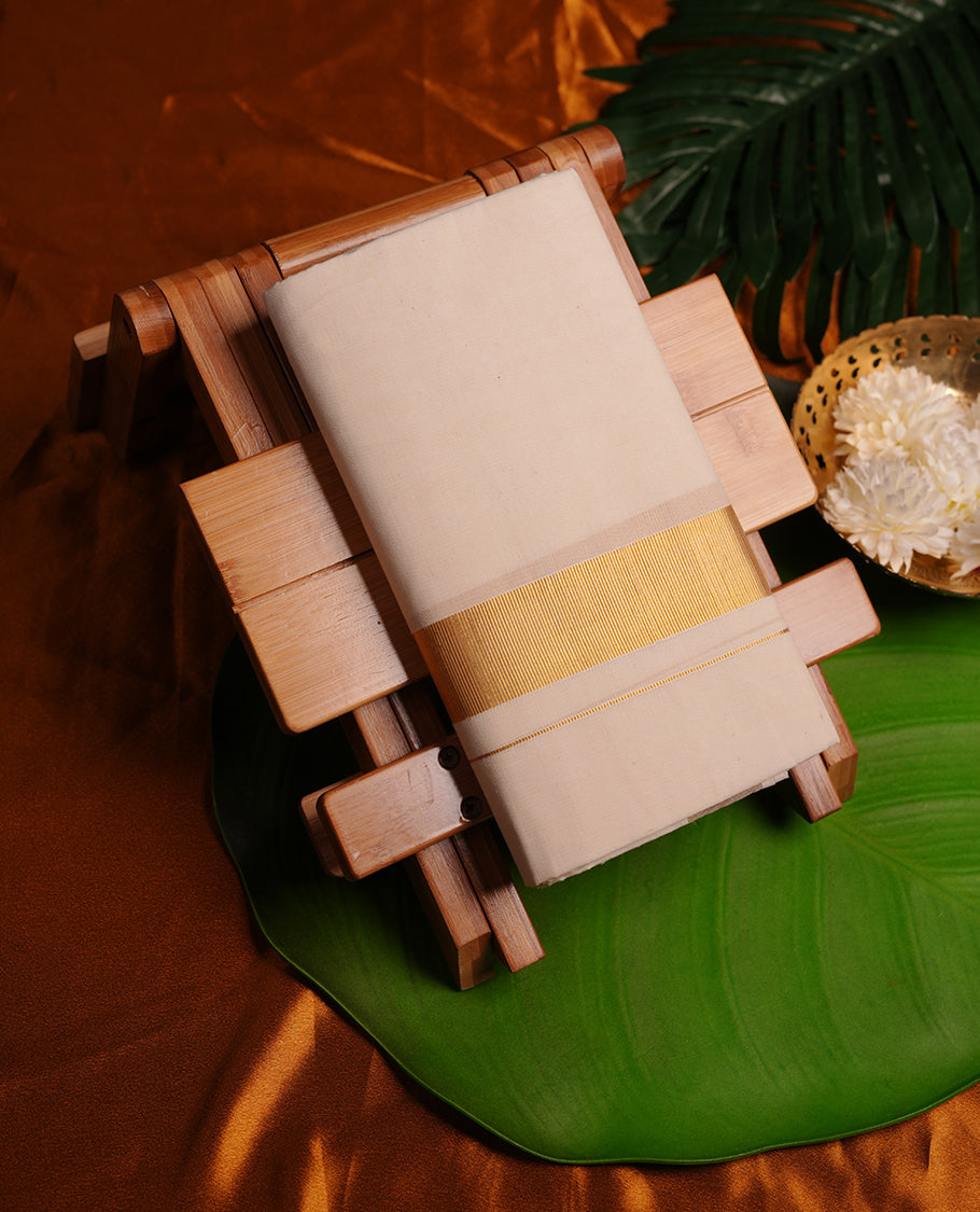 Cream colour cotton double dhoti featuring 2 inch gold kasavu zari border