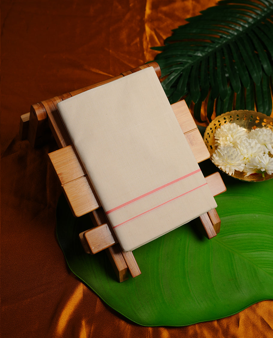 Cream colour cotton single dhoti featuring light pink colour simple border