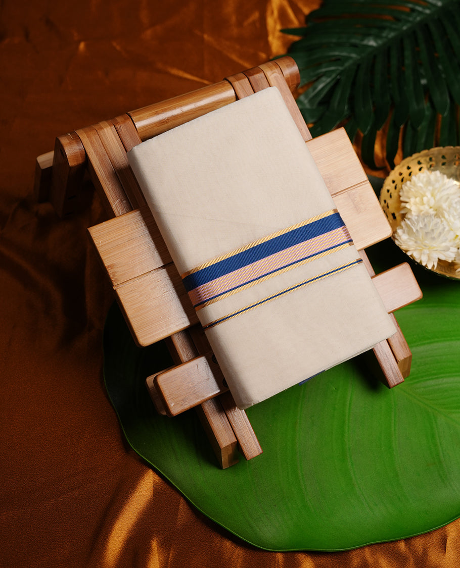 Cream colour cotton double dhoti featuring blue and light pink colour border with gold zari border