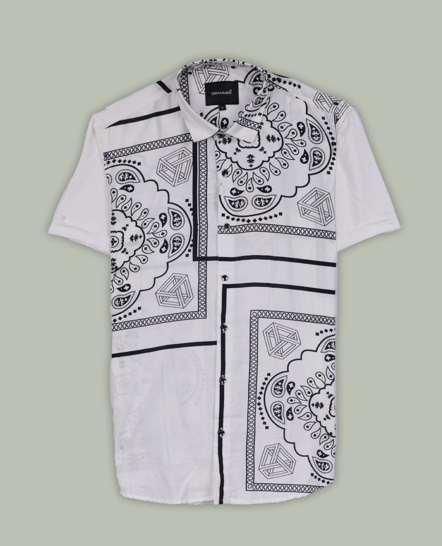 White colour shirt adorned with elegant black colour floral prints, Designed with a classic collar and short sleeves, this timeless piece offers a crisp and casual look, perfect for both work and weekend wear.