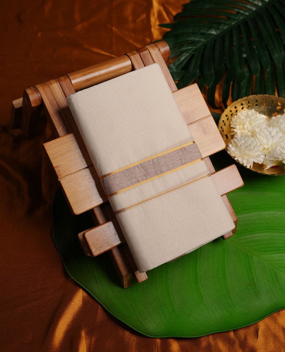 Cream colour cotton double dhoti featuring light brown colour border with gold zari border