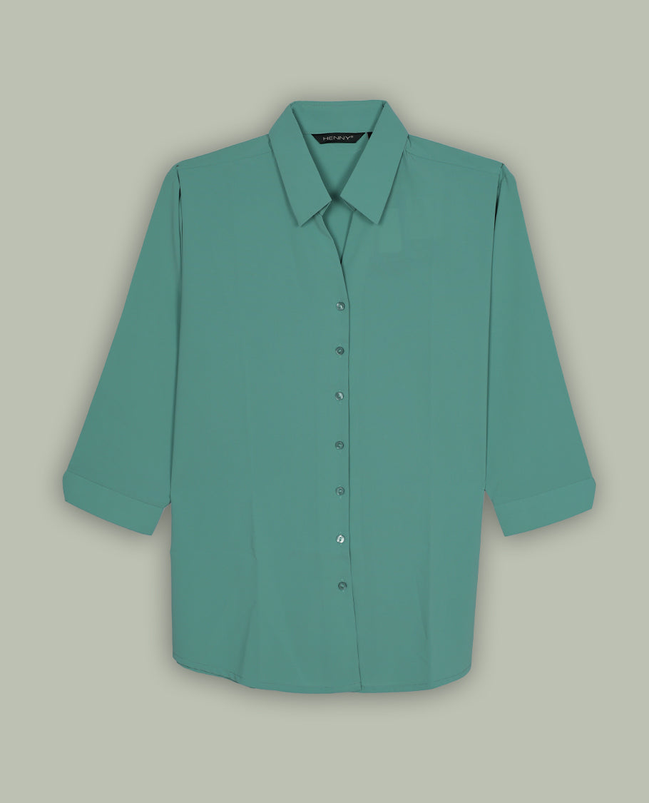 Turquoise colour women’s shirt featuring a classic pointed collar, button-down front and easy 3/4th sleeves
