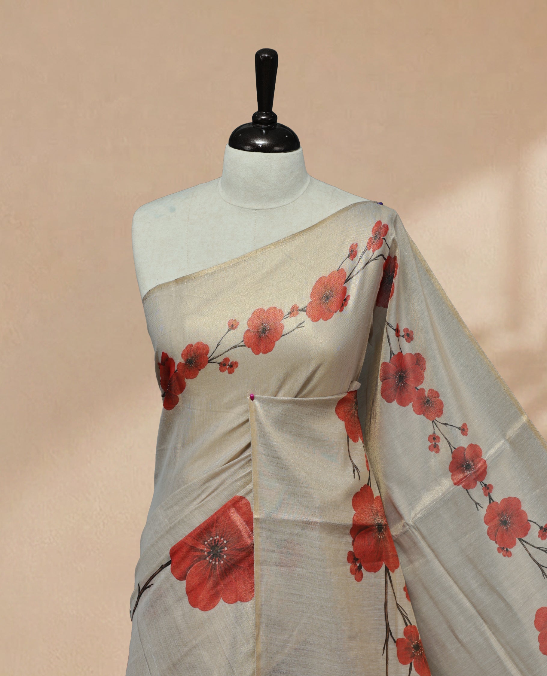 Butter Cream colour Linen Tissue Saree featuring Red colour small & Big floral printed border, Comes with Contrast Self Printed Blouse.