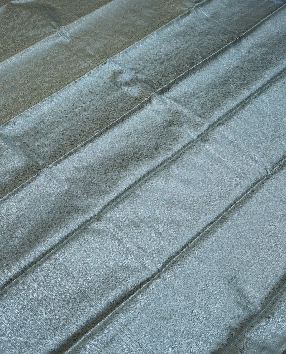 Silver Colour Tissue Saree having Zari Worked Body with Self Colour Brocade Border and Blouse