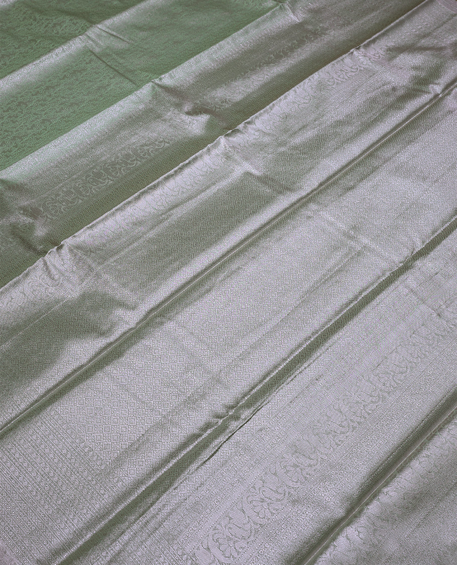 Pista Green Colour Tissue Saree having Zari Worked Body with Self Colour Brocade Border and Blouse