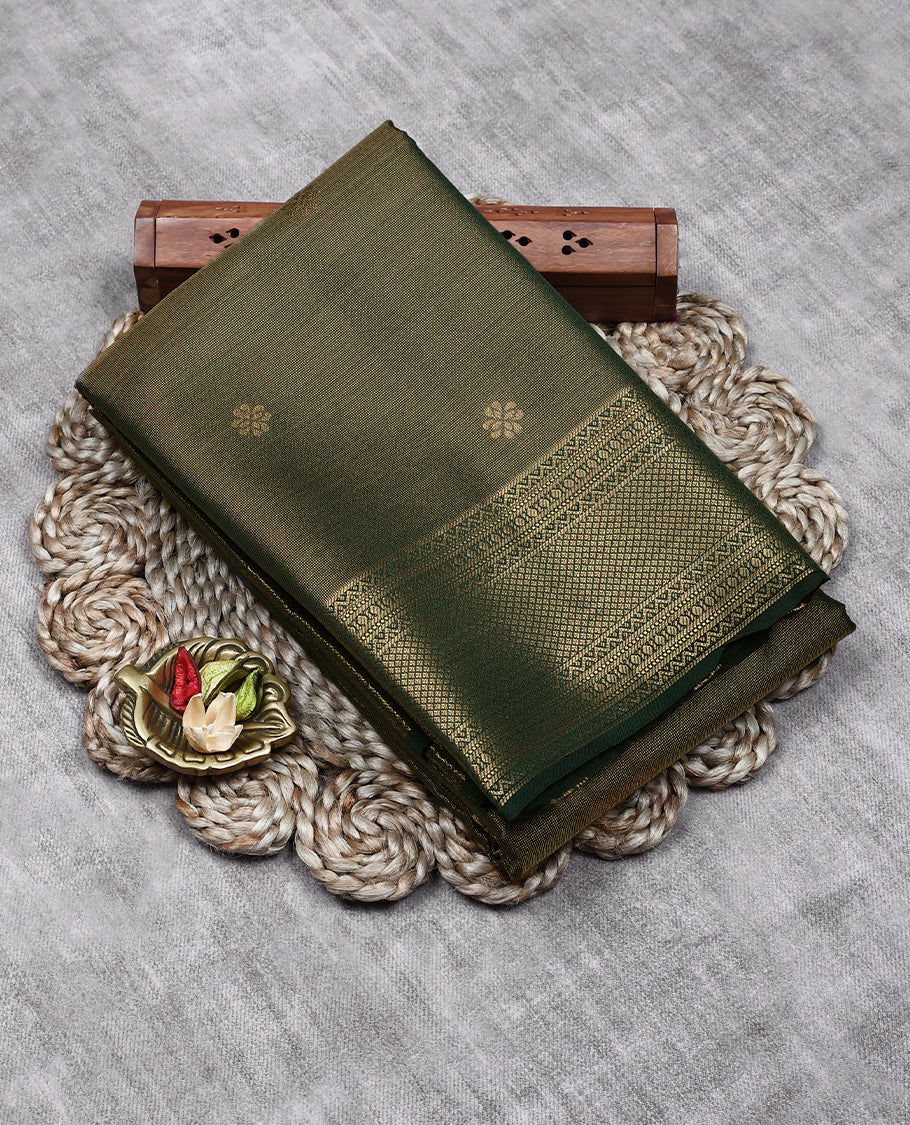 Dark Green Colour Tissue Saree having Golden Zari Worked Body with Self Coloured Border and Blouse