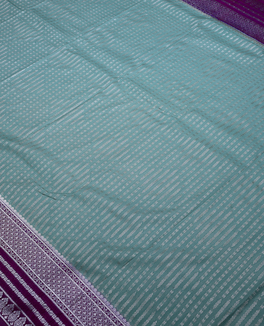 Baby Blue Colour Semi Banarasi Saree having Zari Worked Body with Contrast Colour Border and Blouse