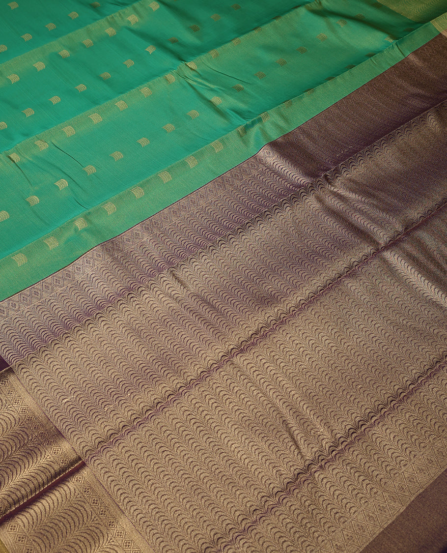 Light Green Colour Art Tissue Saree having Golden Buttas in Body with Golden Border and Contrast Colour Blouse