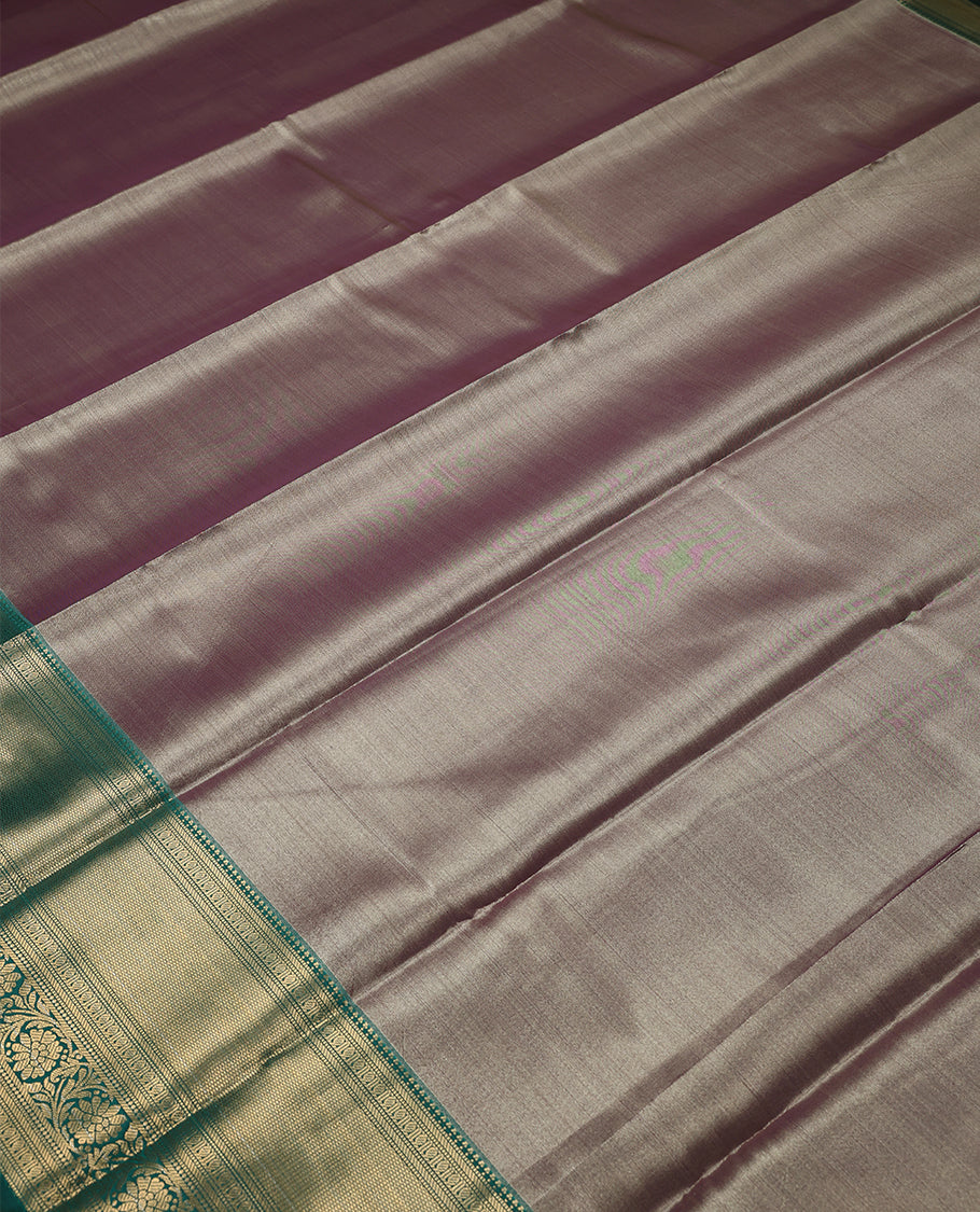Pastel Violet Colour Art Tissue Saree having Plain Body with Dark Green Border and Blouse