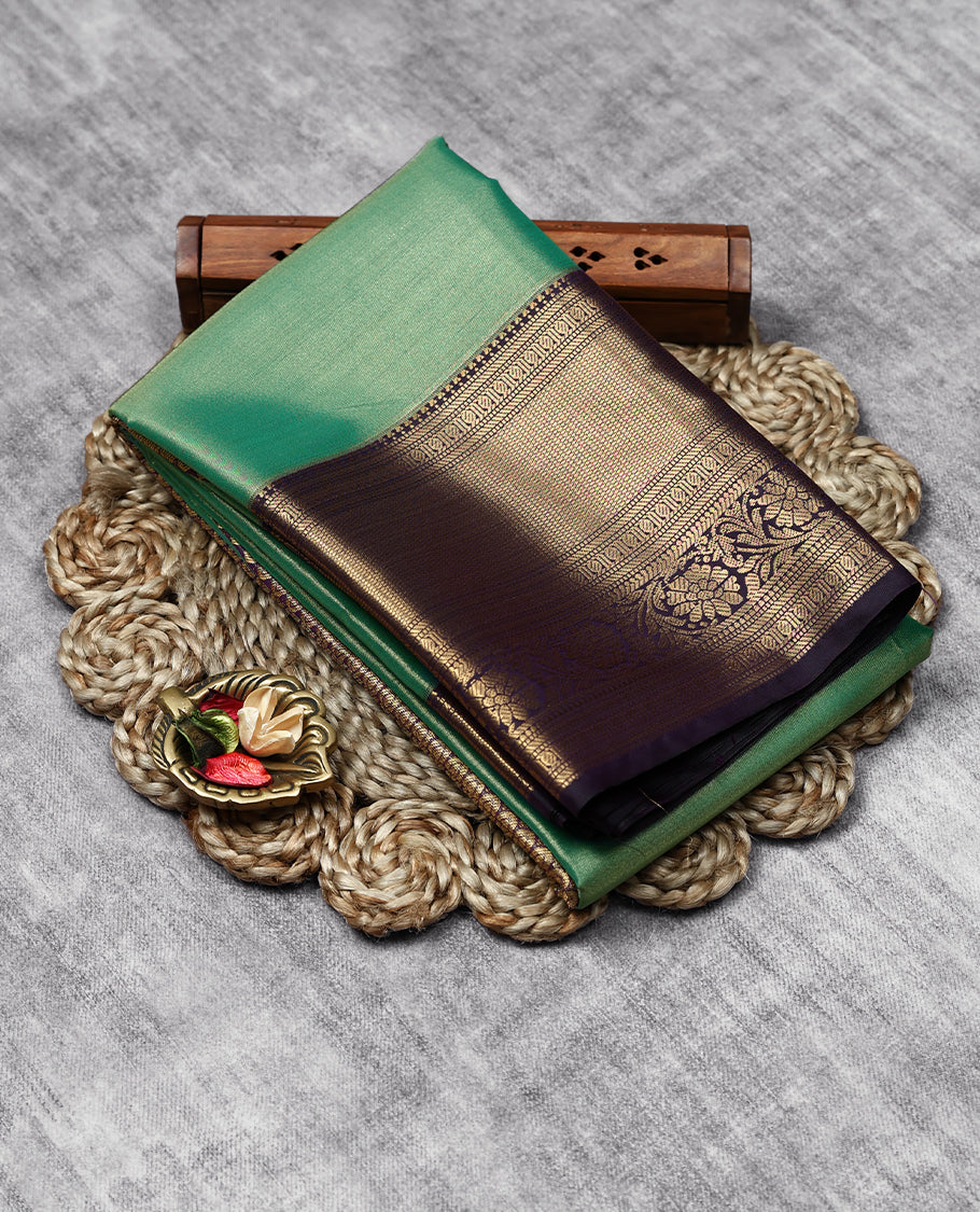 Fern Green Colour Art Tissue Saree having Plain Body with Dark Grape Colour Border and Blouse
