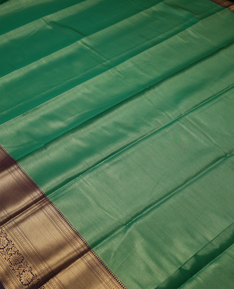Fern Green Colour Art Tissue Saree having Plain Body with Dark Grape Colour Border and Blouse