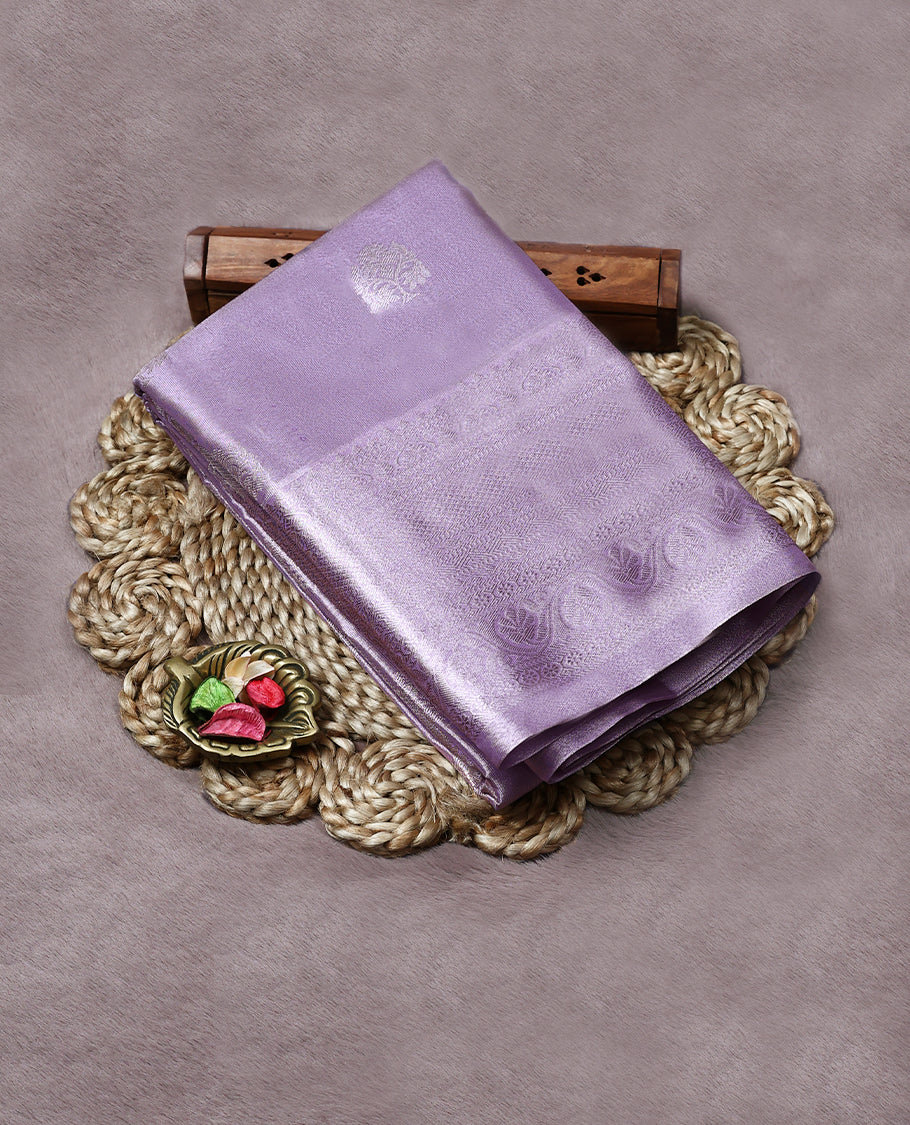 Pastel Lavender Colour Art Tissue Saree having Zari Worked Body with Self Colour Brocade Border and Blouse