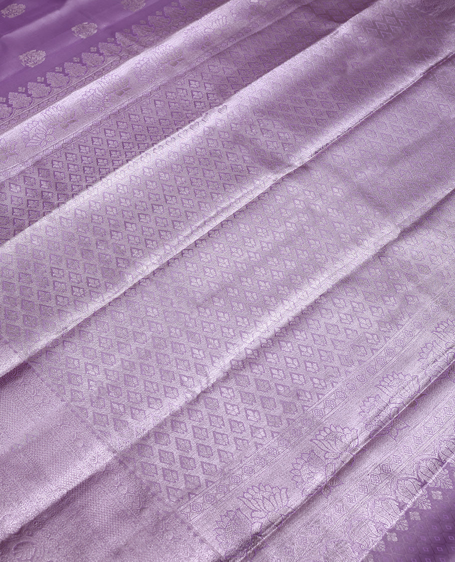 Pastel Lavender Colour Art Tissue Saree having Zari Worked Body with Self Colour Brocade Border and Blouse