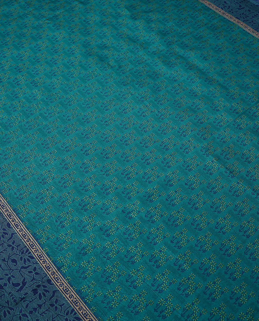 Light Peacock Blue Colour Manipuri Saree having Flower Prints in Entire Body with Contrast Printed Border and Blouse
