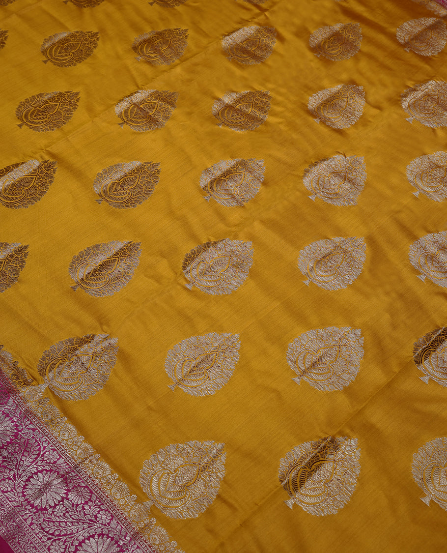 Mango Yellow Colour Banarasi Silk Saree having Golden Leaf Work in Body with Dark Magenta Colour Blouse and Border