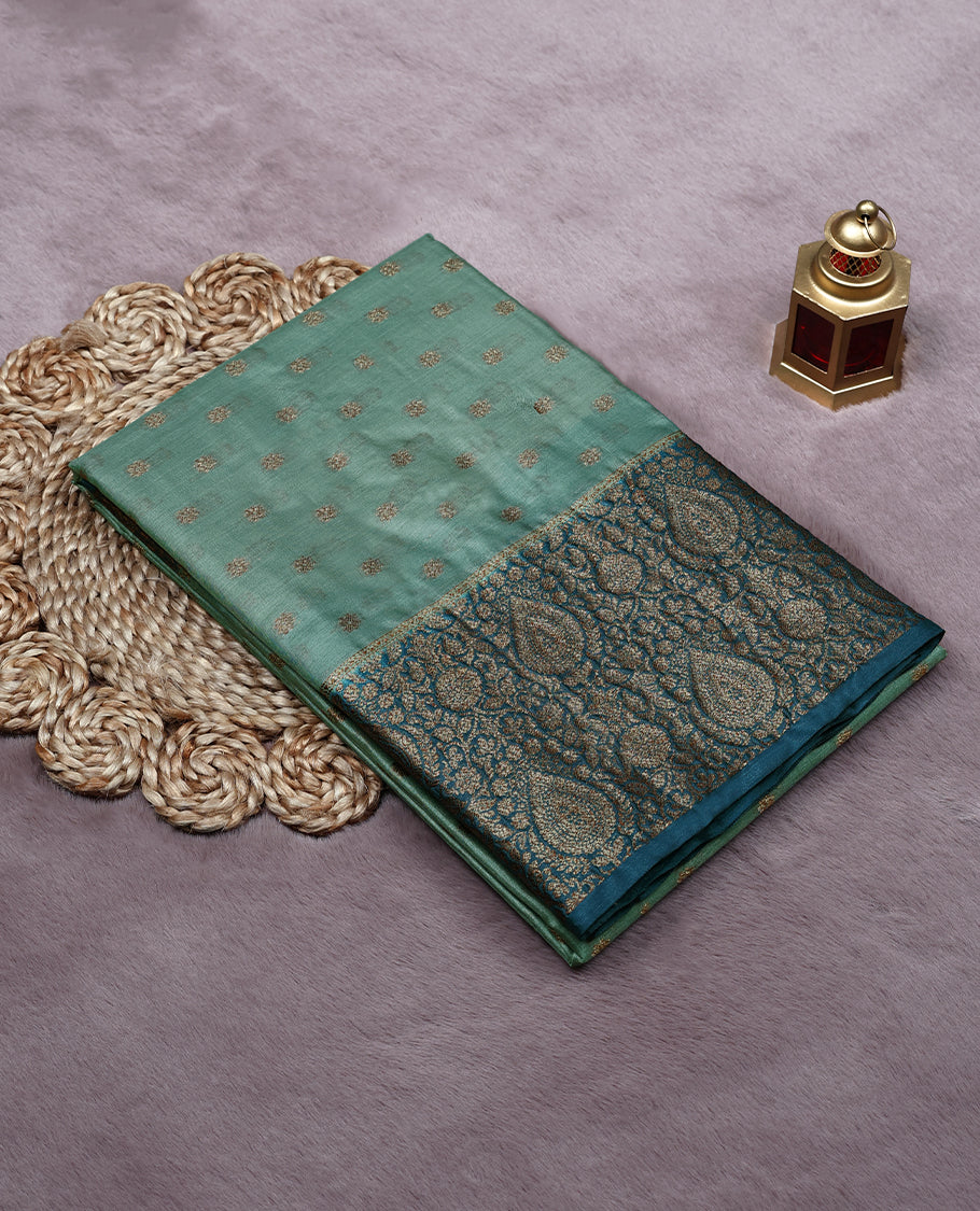 Pastel Pista Colour Tussar Banarasi Silk Saree having Golden Buttas in Body with Dark Blue Colour Blouse and Border
