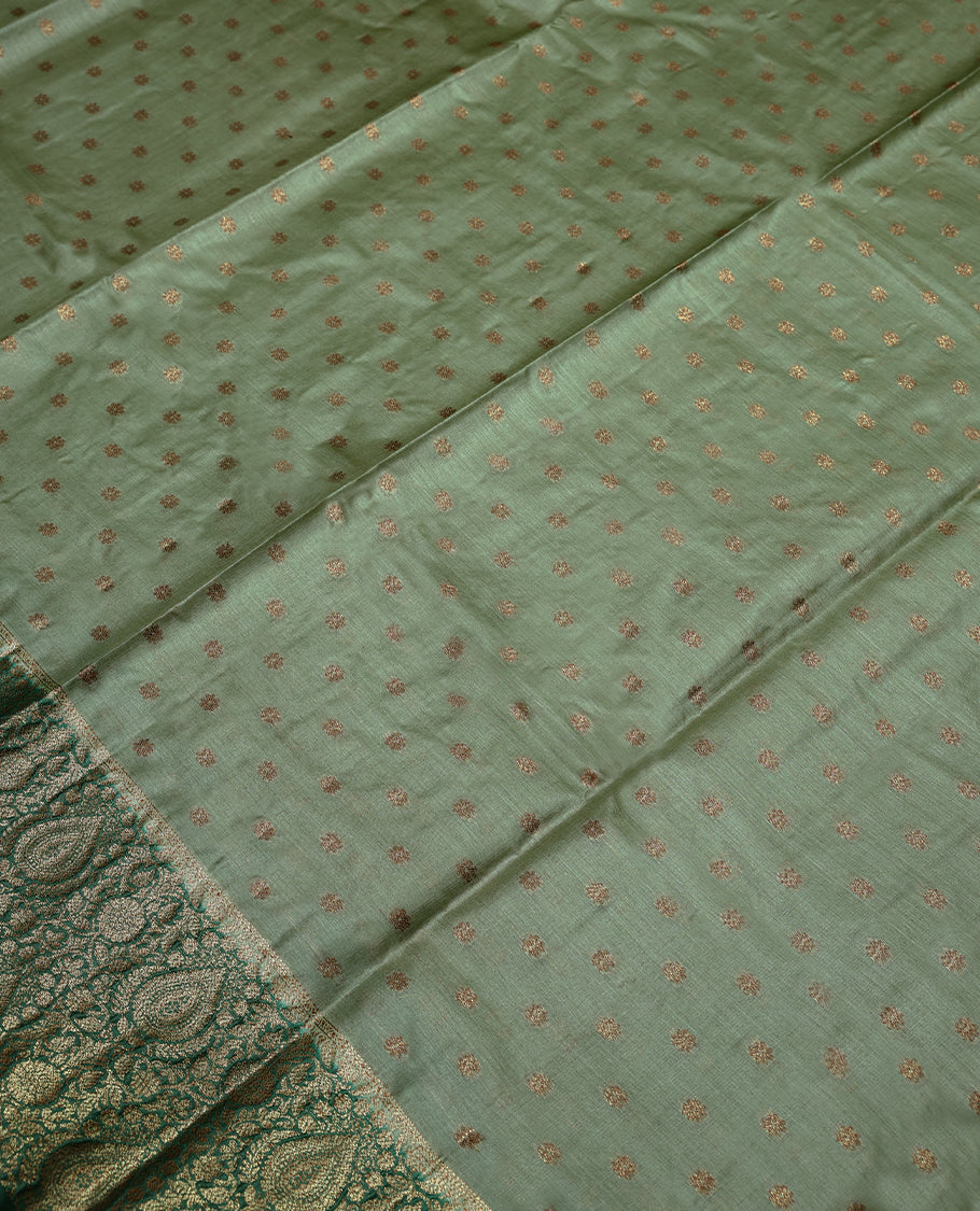 Light Green Colour Tussar Banarasi Silk Saree having Golden Buttas in Body with Dark Green Colour Blouse and Border