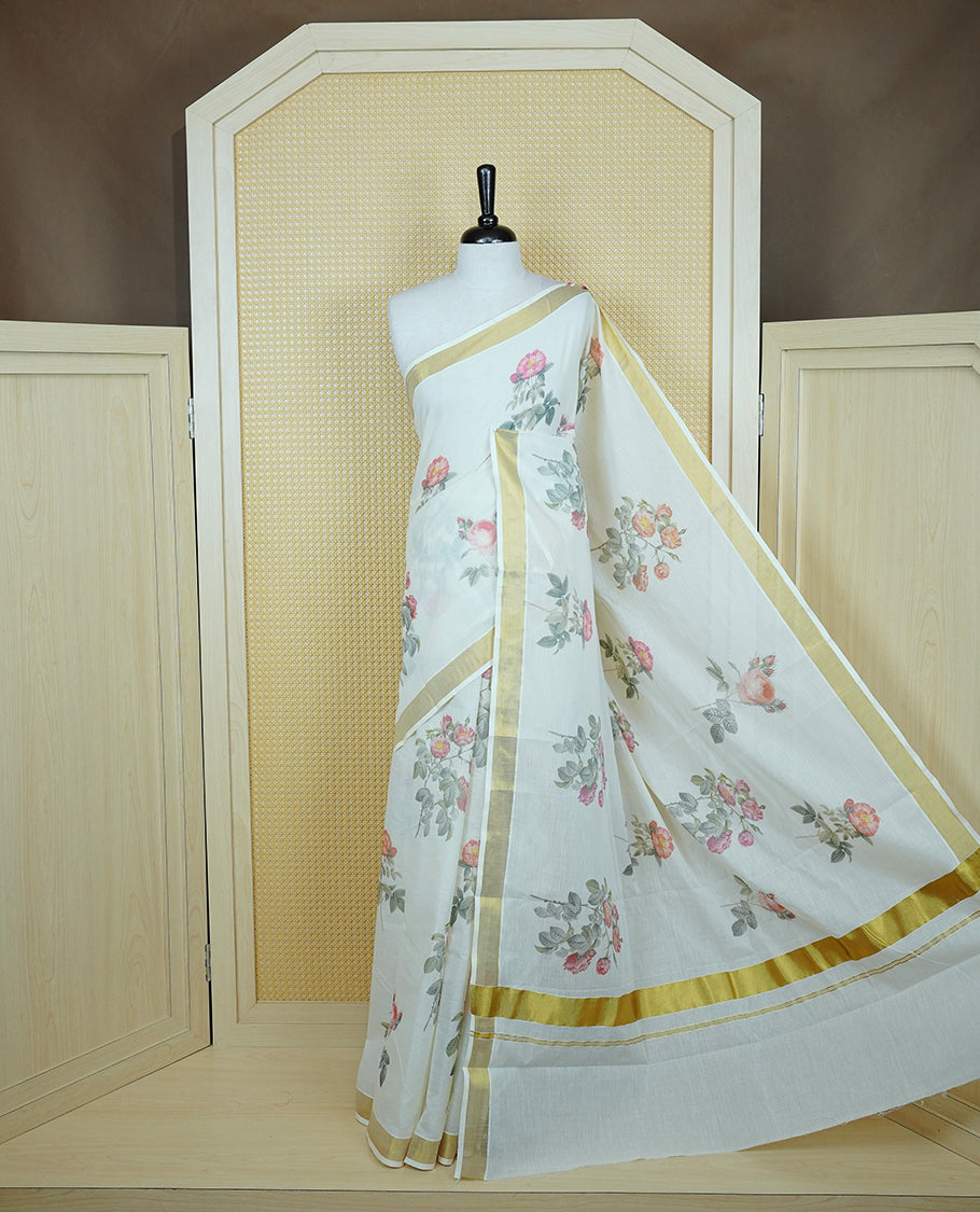 Cream colour Cotton kerala Saree featuring Flower Print on body, Enhancing Gold zari kasavu border, comes with matching blouse piece.