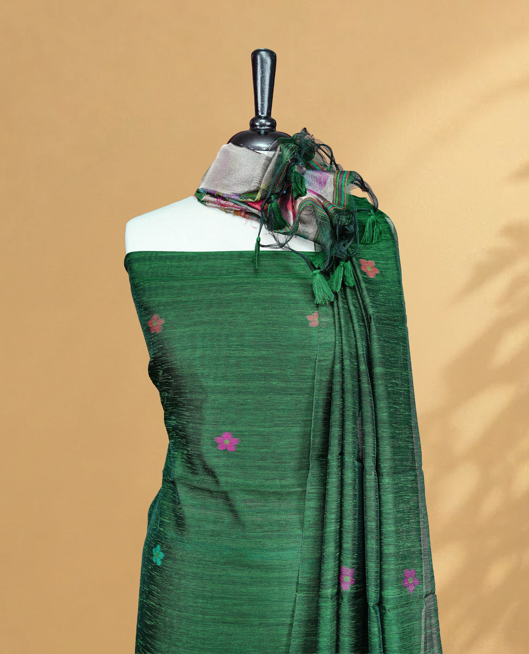 Green Colour Salwar material Featuring floral buttas & zari work on body, paired with Matching Bottom and same Patterned Dupatta.