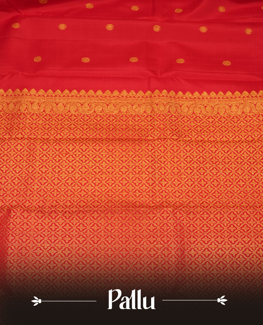 Red colour pure traditional Kancheepuram silk saree adorned with an elegant zari motif on the body