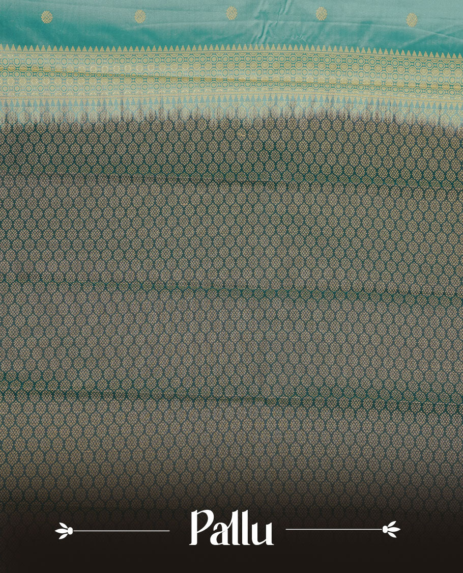 Aqua colour soft silk saree featuring gold zari motifs on body, complemented by contrast Teal colour with zari border, paired with matching blouse piece.